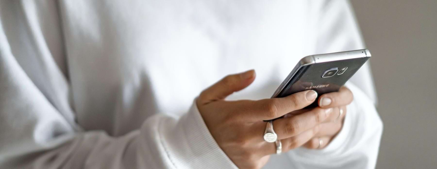 a person holding a cell phone